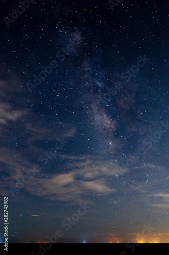 night sky with clouds and stars