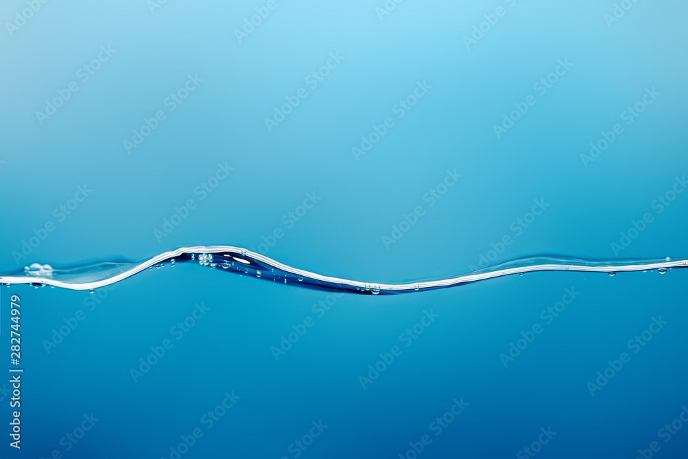 transparent pure water wave on blue background transparent pure water wave on blue background
