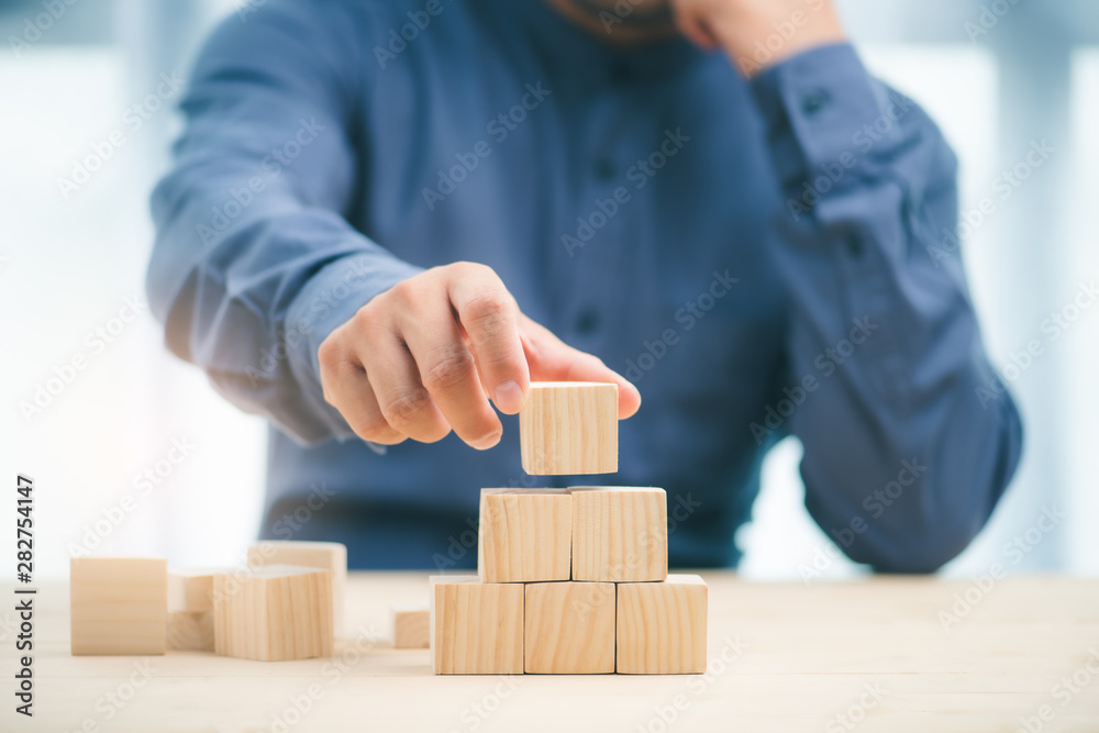 hand stack woods block step on table. business development Decide and choose concept.copy space. hand stack woods block step on table. business development Decide and choose concept.copy space.