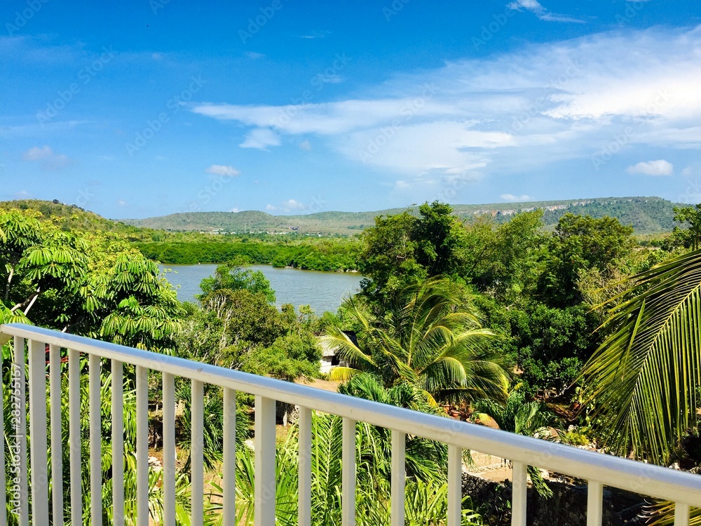 Fototapeta premium View from the resort balcony on pond and hills of countryside in Holguin, Cuba