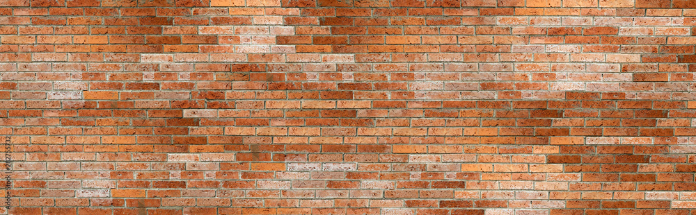 Obraz premium red and textured brick wall background, panorama