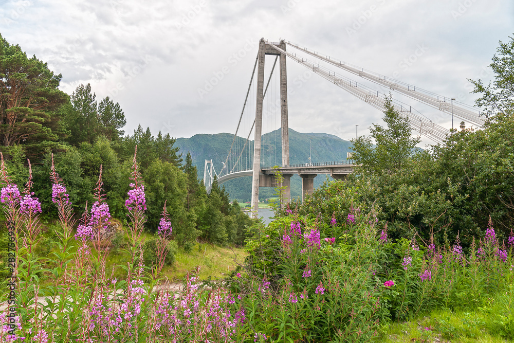 Gjemnessund Bridge is a suspension bridge between the mainland and the island of Bergsoya.Gjemnes municipality.Norway