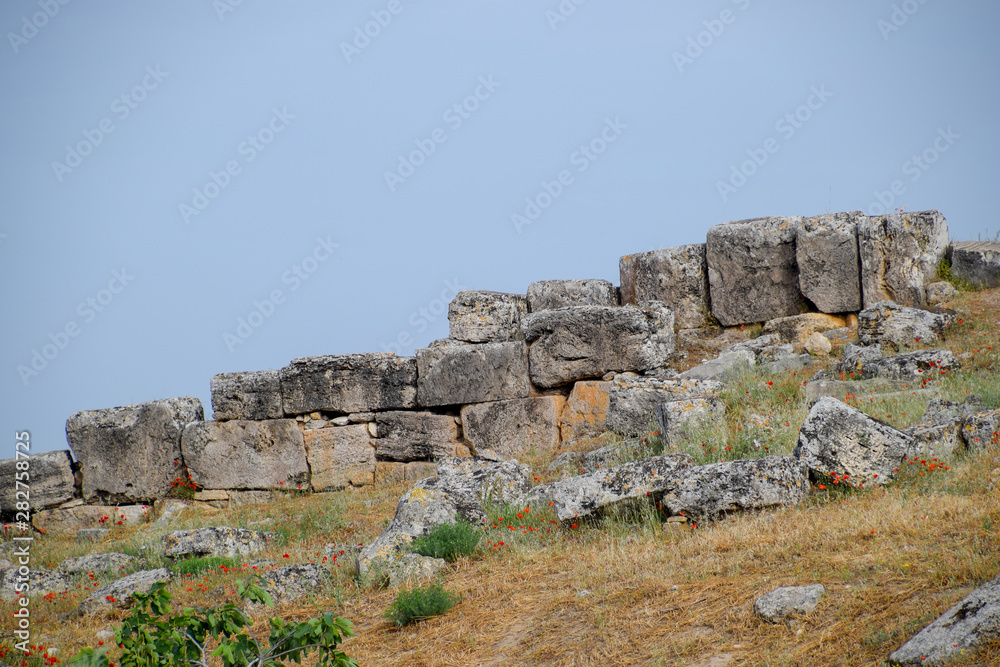 Limestone blocks an earthquake-destroyed wall of city of Hierapolis.