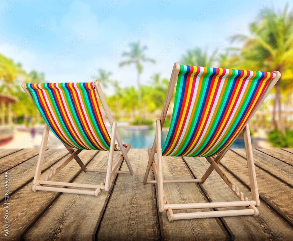 Pool to the Beach with Palms on background Pool to the Beach with Palms on background