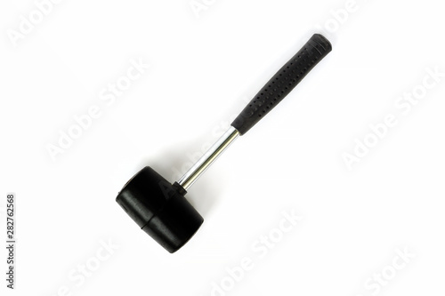 Close up black rubber mallet isolated on white background. Rubber hammer is a construction tool.