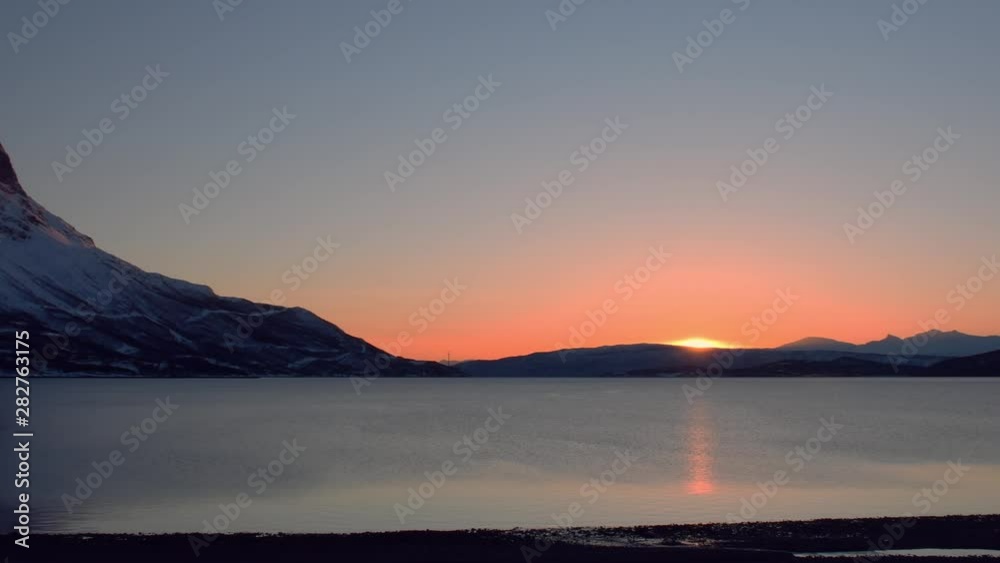 Sunset panorama over North Norway fjord and arctic ocean. Very impressive views and chill times. Sunset panorama over North Norway fjord and arctic ocean. Very impressive views and chill times.