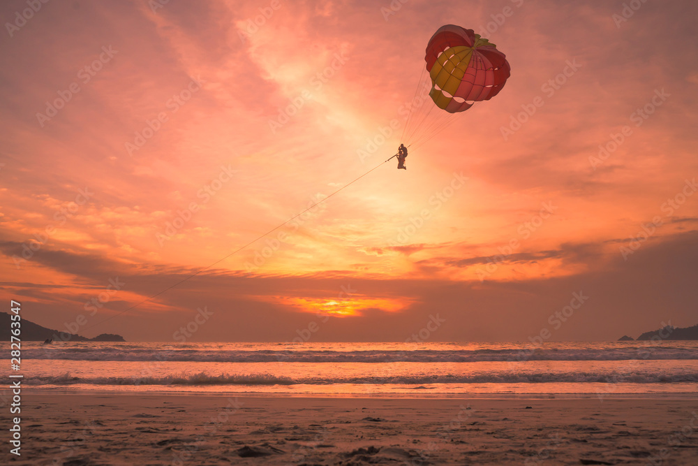 Sunset lovers, bright orange sky, on the beach Famous Phuket Patong Thailand Sunset lovers, bright orange sky, on the beach Famous Phuket Patong Thailand