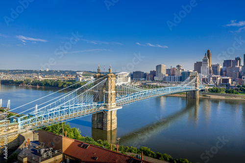 Panoramic view of Cincinnati downtown with the historic Roebling suspension bridge over the Ohio river