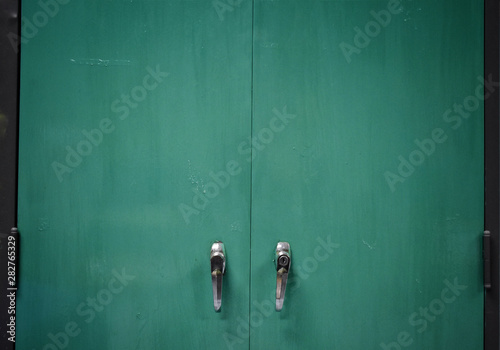 Closeup old lockers that have been painted in green to look new © Wararat