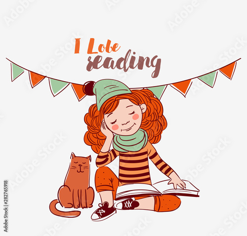 Cute, funny girl reads a book