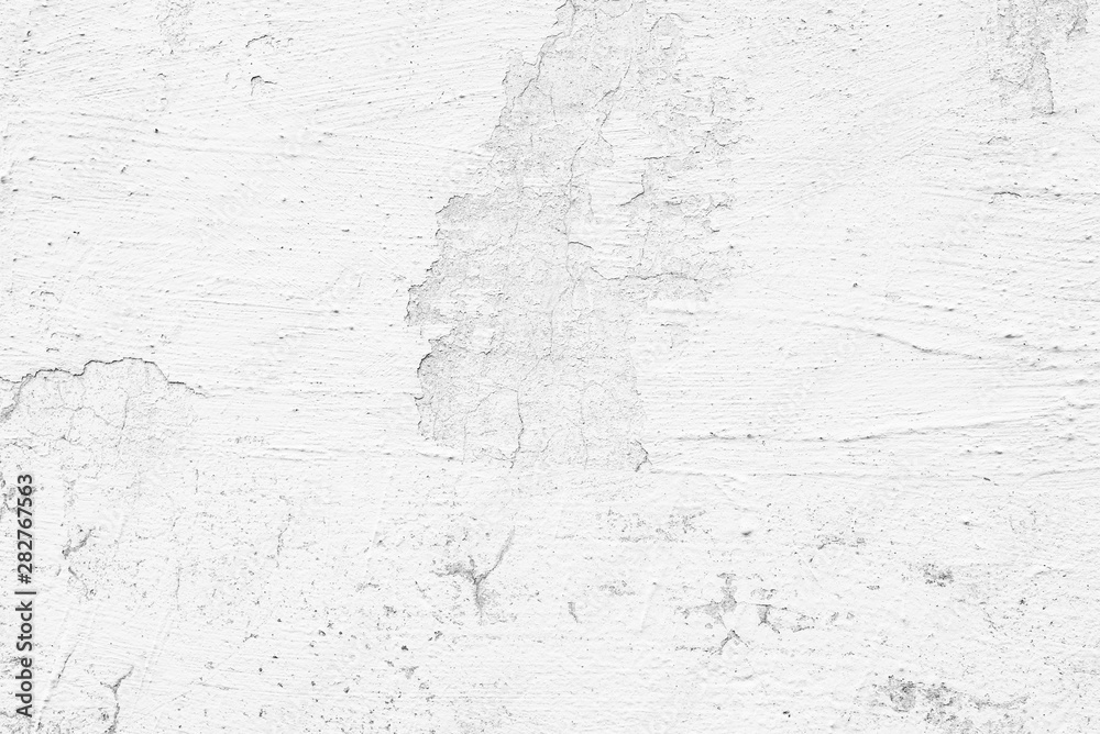 Texture of a concrete wall with cracks and scratches which can be used as a background Texture of a concrete wall with cracks and scratches which can be used as a background