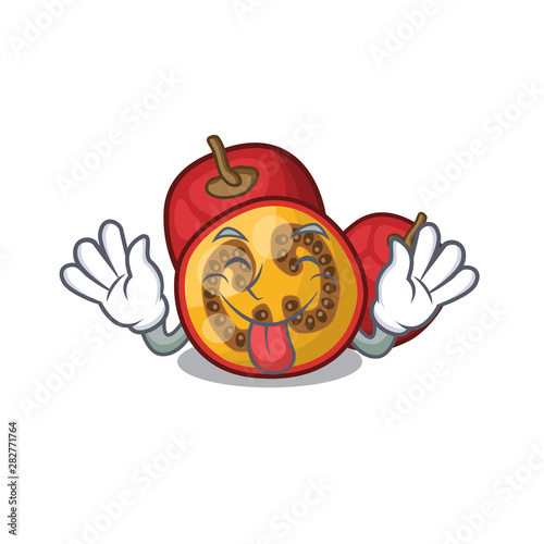 Tongue out fruit tamarillo above mascot wood table