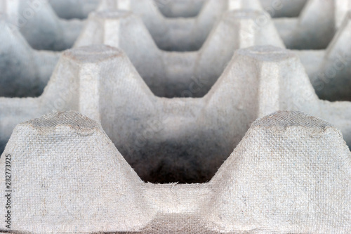An Empty Biodegradable Molded Pulp Fiber Egg Carton Tray.