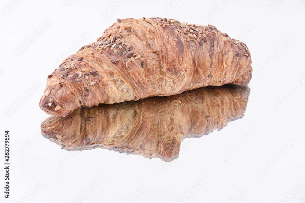 A tasty and nutritious croissant with sesame seeds on top