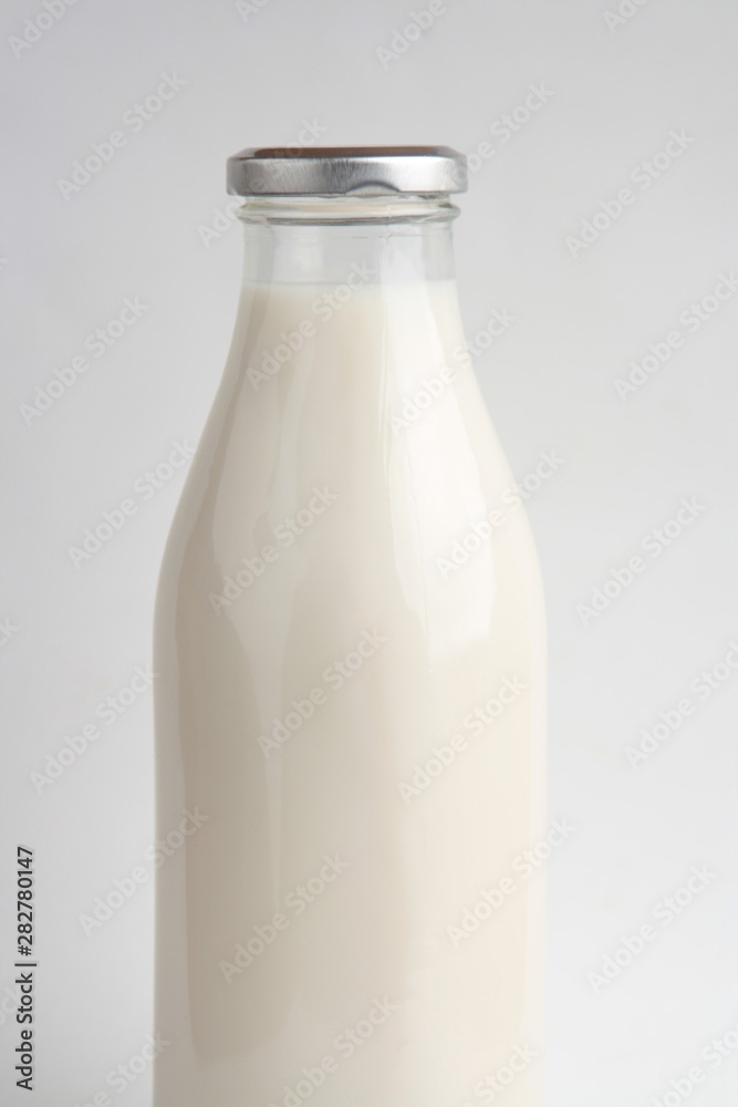 glass bottle with delicious milk.. glass bottle with delicious milk..