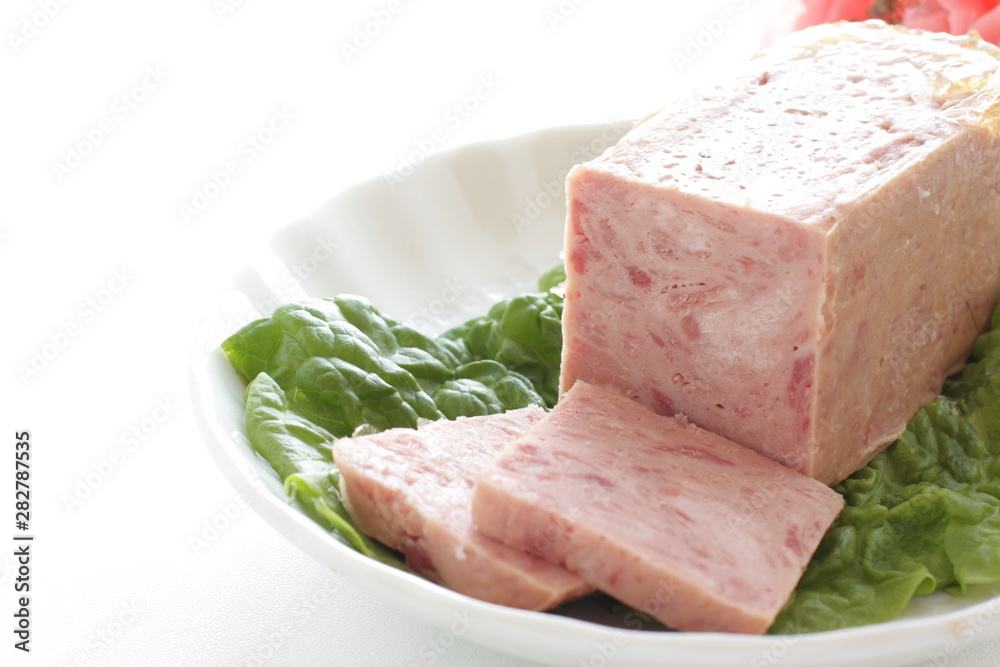 luncheon meat on lettuce with copy space luncheon meat on lettuce with copy space