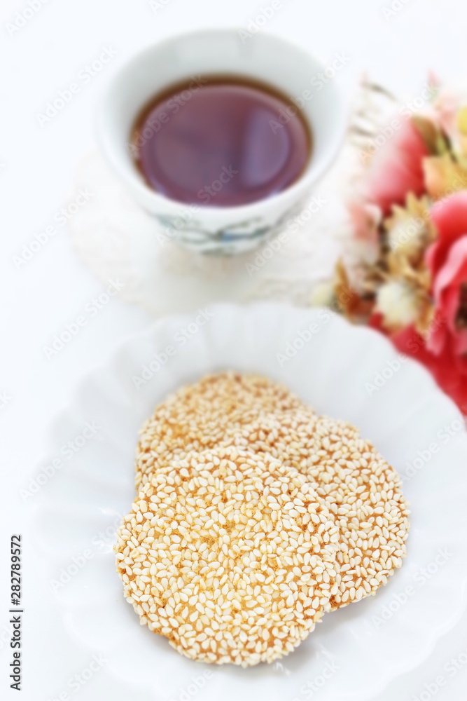 Chinese confectionery, sesame cookie on dish Chinese confectionery, sesame cookie on dish