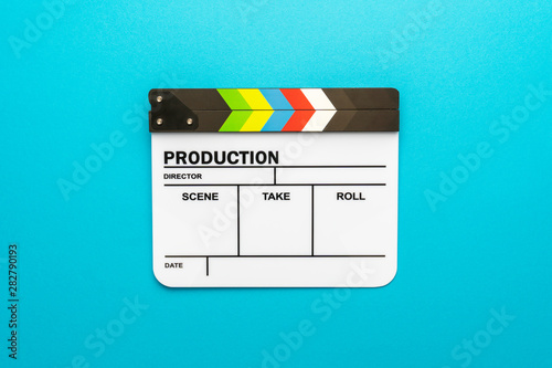 Fototapeta Top view of professional white acrylic clapperboard