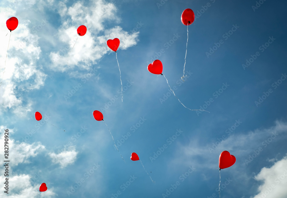 Red heart shaped Ballons blue sky Red heart shaped Ballons blue sky