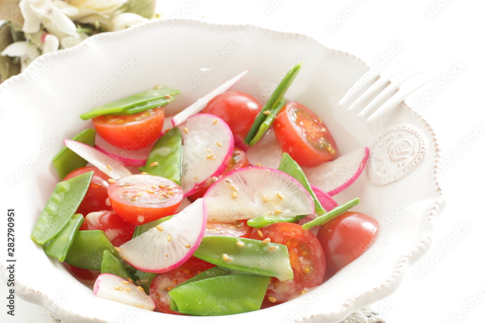 Vegetarian salad, radish and tomato sesame salad Vegetarian salad, radish and tomato sesame salad