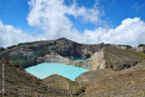 View of the two of the three tri-colored lakes on the peak of Ganung Kelimutu National Park in Flores, Indonesia. photo