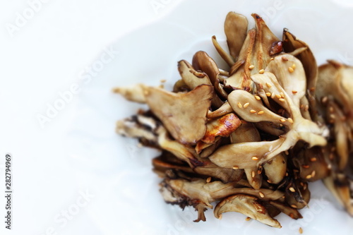 chinese food, maitake mushroom and sesame seed stir fried
