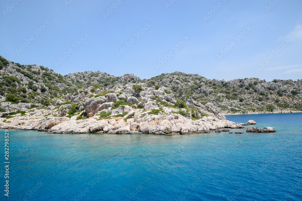 ruins of the ancient city of Kekova on the shore.