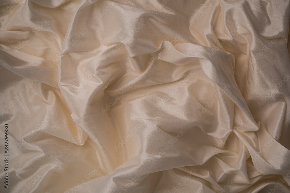 Background image of crumpled pink fabric Background image of crumpled pink fabric