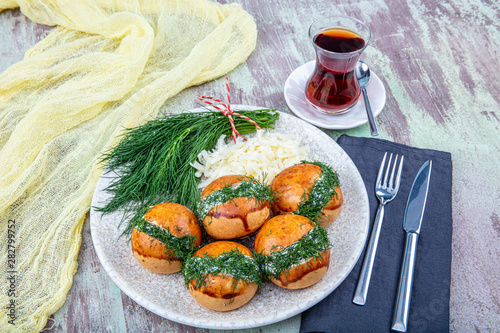 Traditional Turkish pastry pogaca with cheese filling with dill. Turkish name: Sakalli, sacakli, corek - pogaca. photo