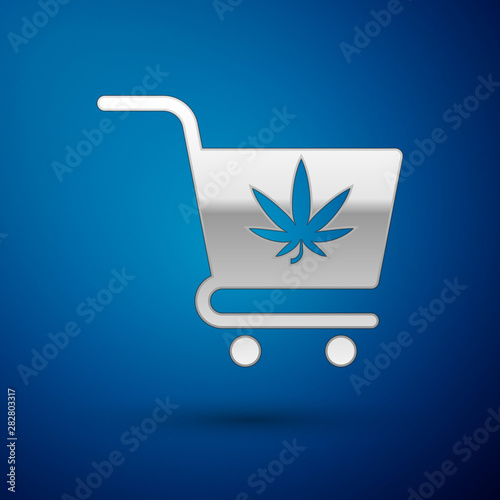 Silver Shopping cart with marijuana or cannabis leaf icon isolated on blue background. Online buying. Delivery service. Supermarket basket. Vector Illustration