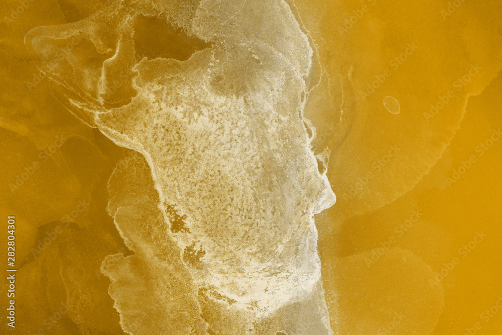 Hand painted gold alcohol ink background. Abstract delicate yellow texture. Contemporary wallpaper. Hand painted gold alcohol ink background. Abstract delicate yellow texture. Contemporary wallpaper.