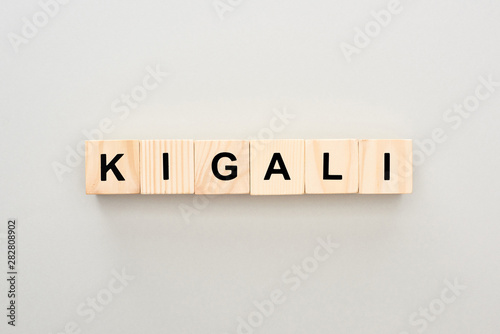 top view of wooden blocks with Kigali lettering on grey background