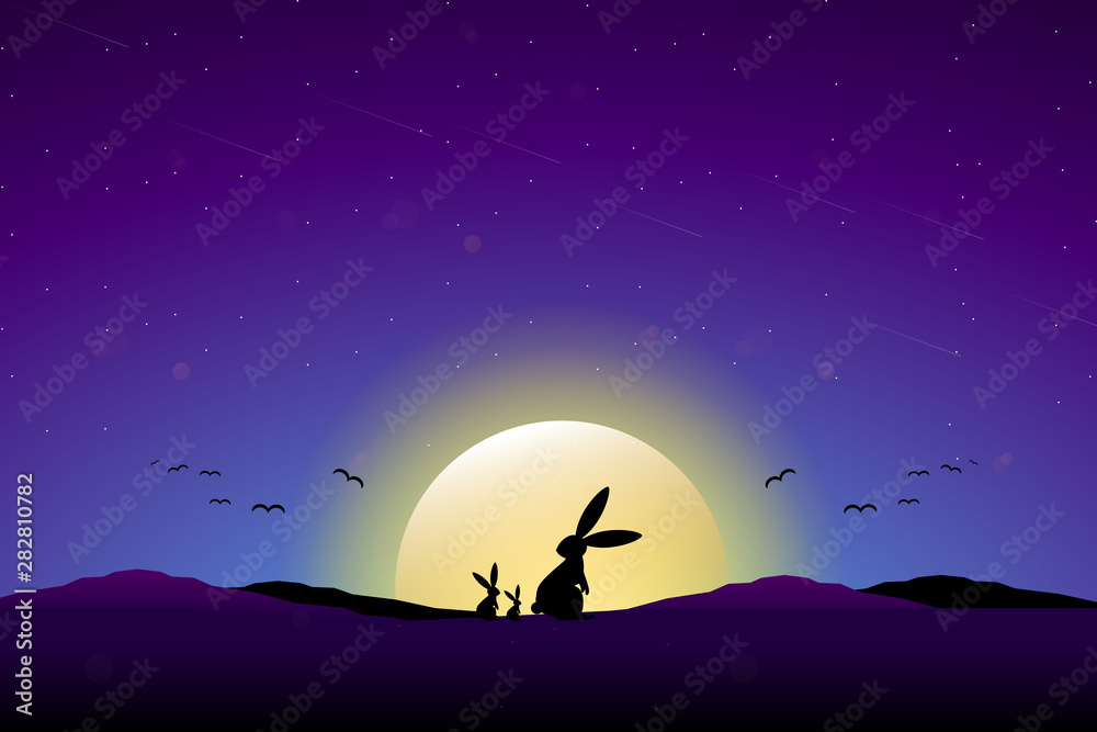 Landscape of silhouette rabbits with full moon and night sky background