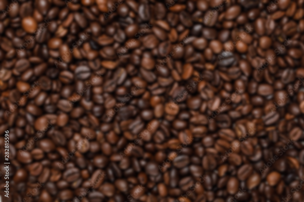 Fototapeta premium top view of delicious fresh textured coffee grains
