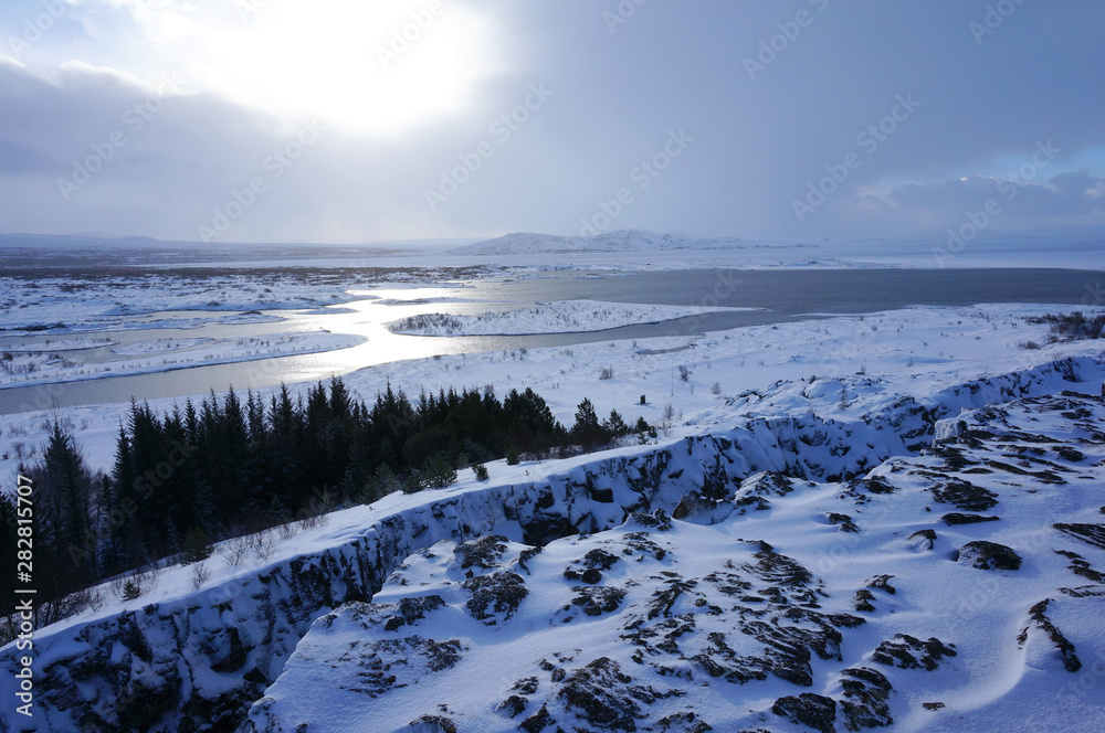 Winter landscape with hills and river