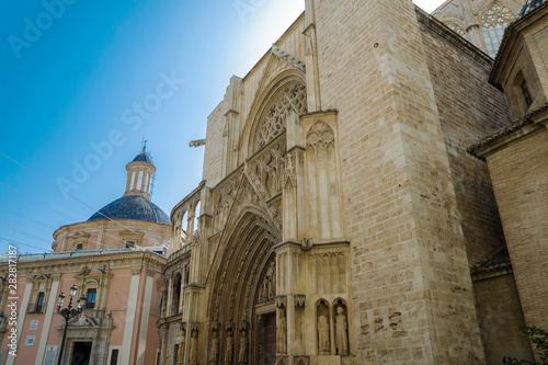Valencia, Spain - 07/21/2019:Valencia Cathedral - La Seu de Valencia. The majestic cathedral located on La Plaza De La Virgen - architectural styles: Baroque, Romanesque and Gothic. 