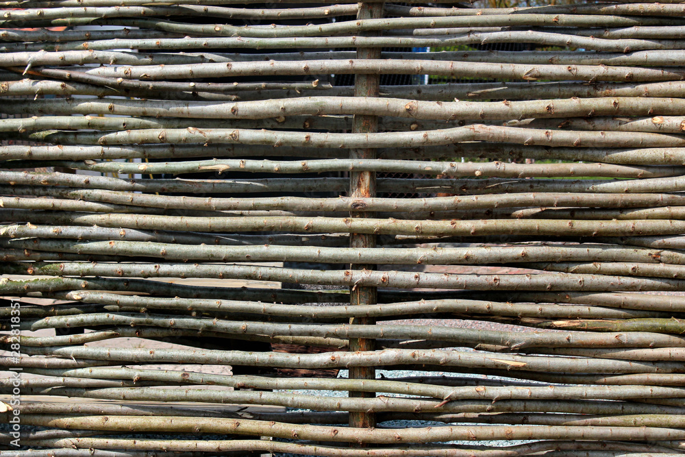Wicker fence of willow branches Wicker fence of willow branches