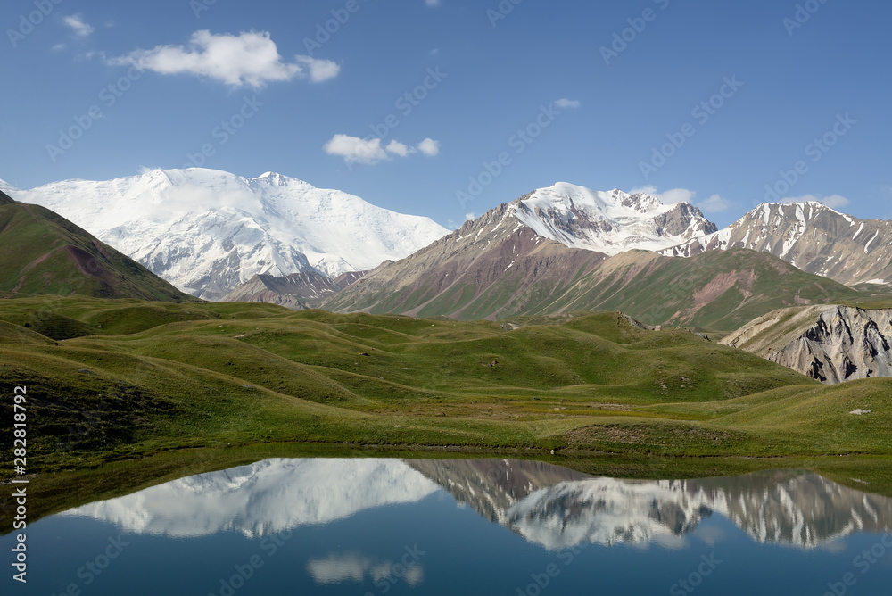 The beautiful Pamir mountains, trekking destination. View on the Lenin Peak, Kyrgyzstan, Central Asia.