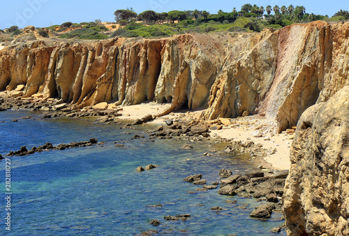 The rocky cliffs overlookig the Atlantic ocean at Praia De Arrifes