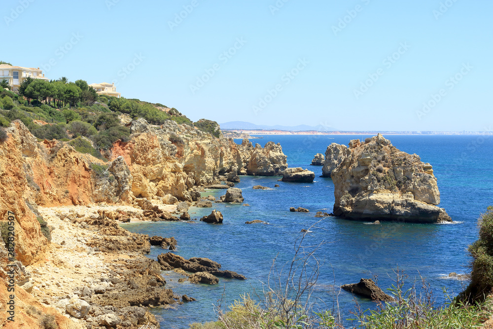 Rocky coastline at Praia Do Arrifao near Albufeira Rocky coastline at Praia Do Arrifao near Albufeira
