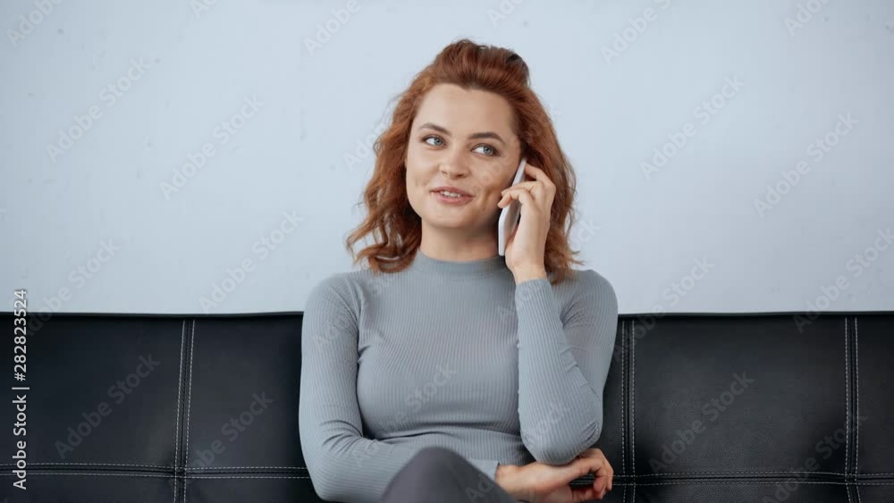 beautiful and smiling woman talking on smartphone beautiful and smiling woman talking on smartphone