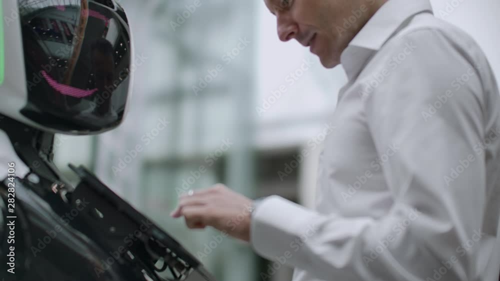 Electronics engineer working, scientist inventor on robot construction. slow-motion. modern robotic technologies. Futuristic robot concept. artificial intelligence, virtual, robot, robots and human Electronics engineer working, scientist inventor on robot construction. slow-motion. modern robotic technologies. Futuristic robot concept. artificial intelligence, virtual, robot, robots and human