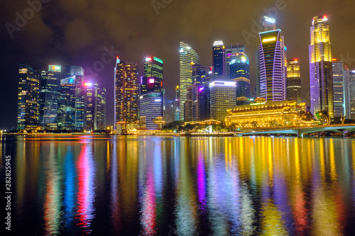 View of the central district of Singapore at night © badahos