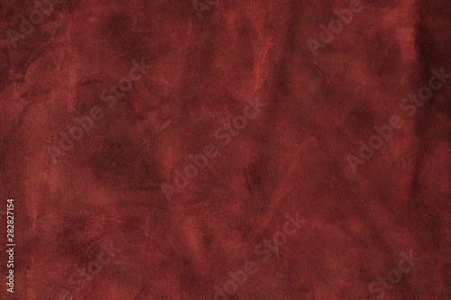 burgundy or dark pink genuine leather texture background, genuine leather
