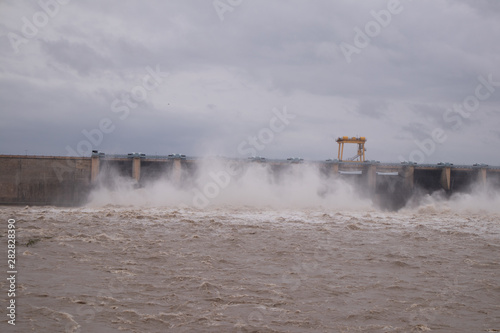 Water filled in Dam due to heavy rain and the gates of the reservior is opened to release the wtarer from the reservoir or dam.