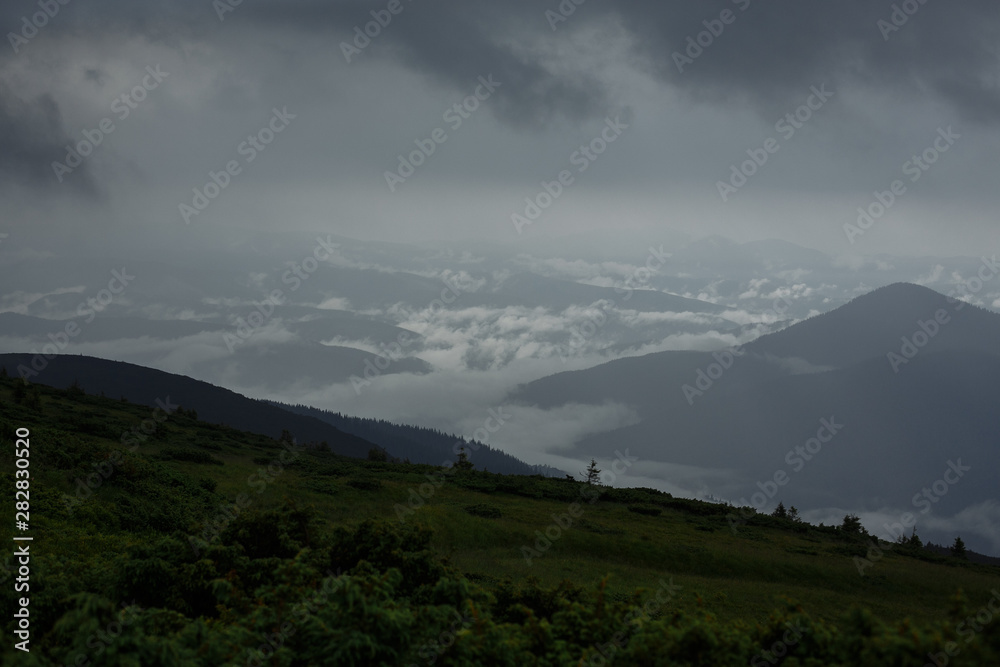 cloudy foggy morning in the mountains with beautiful panorama of the mountains cloudy foggy morning in the mountains with beautiful panorama of the mountains