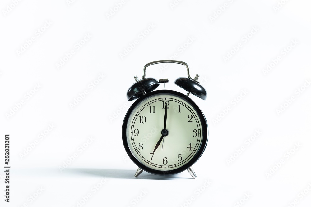 Black alarm clock isolated on white Black alarm clock isolated on white