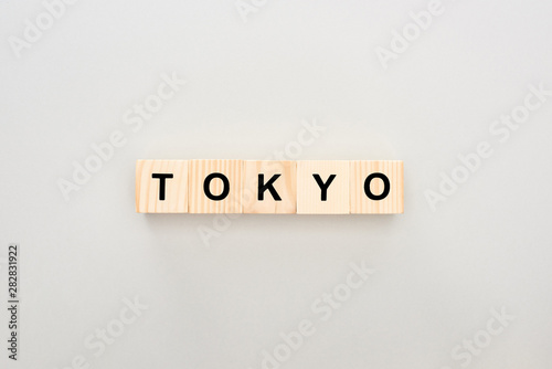 top view of wooden blocks with Tokyo lettering on white background