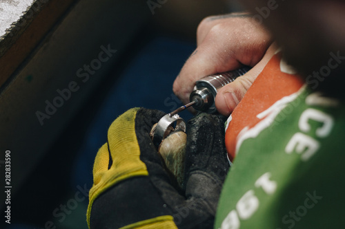 Obraz na plátně Jeweler working on a ring