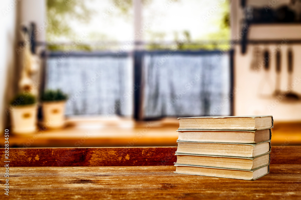 Wooden window space and school books on board Wooden window space and school books on board